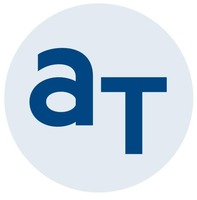 ат