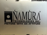 NAMURA TECHNOLOGIES INC. PISTONS WITH AN ATTITUDE